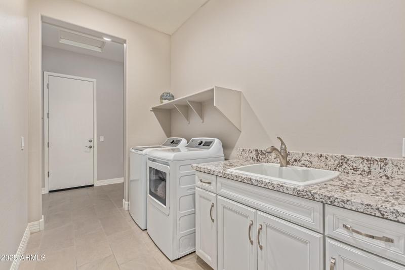 Spacious Laundry With Sink