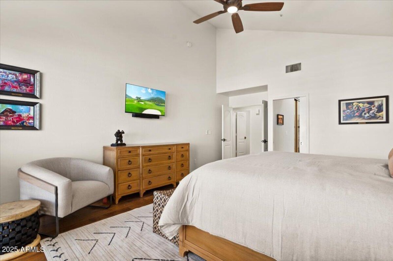 Primary bedroom with TV