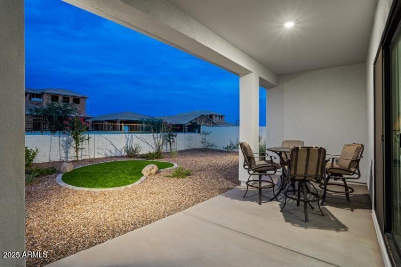 Rear covered rear patio and large yard