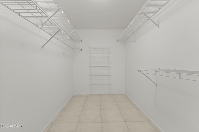 PRIMARY WALK-IN CLOSET