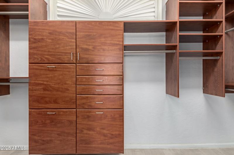 Primary Closet with Built-In Cabinetry