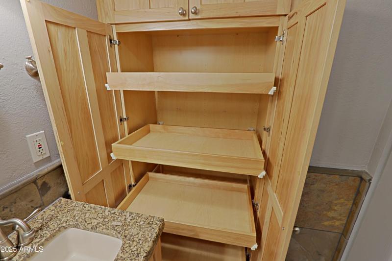 Pullouts in cabinet