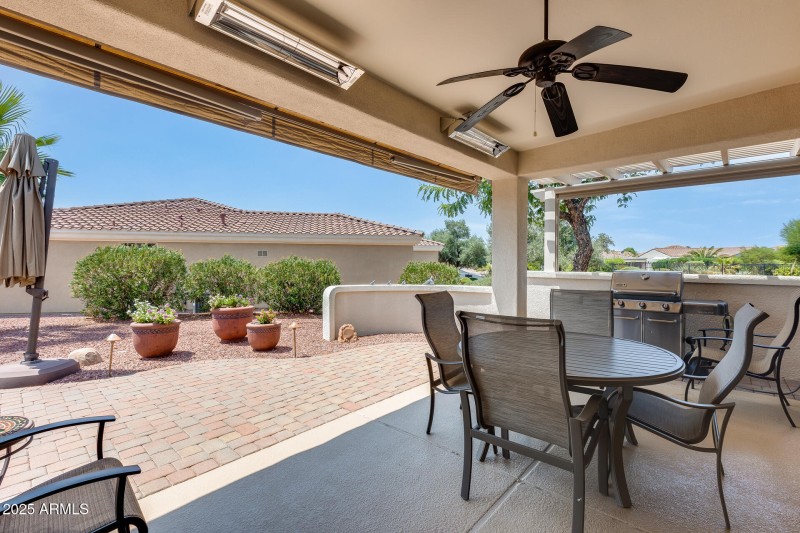 Coverel patio with heaters and shades