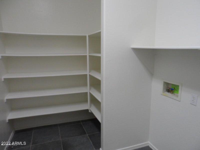 large pantry in laundry room