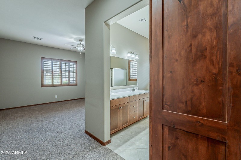Primary bedroom and bathroom