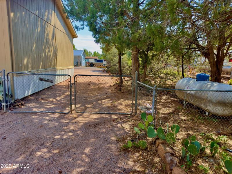SIDE YARD ENTRANCE TO BACK