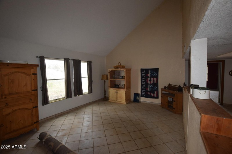 Living room open to dining on right