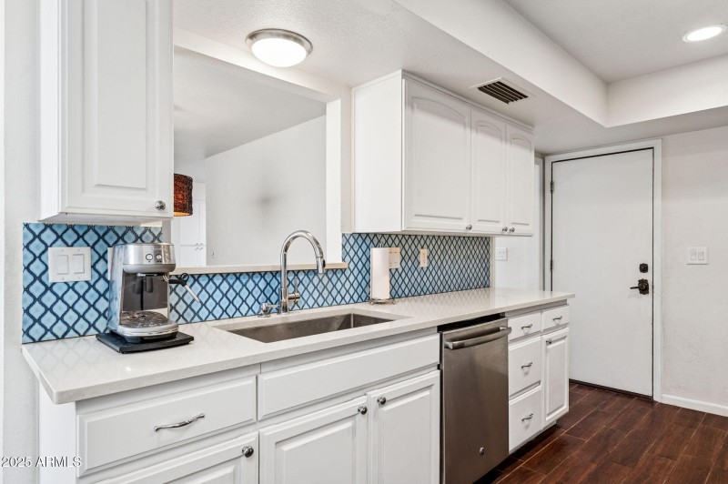 Kitchen w/ View into Dining/Living areas