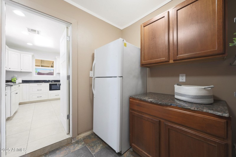 Pantry & Fridge off Kitchen