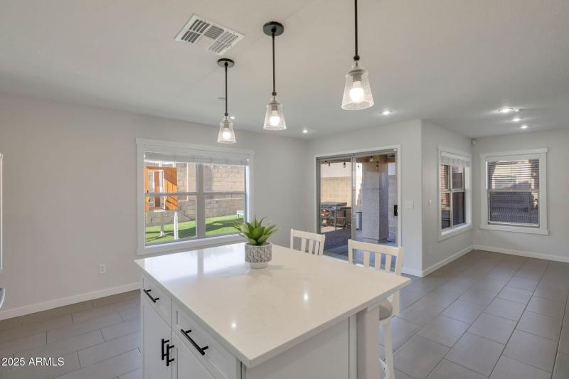 OPENS TO SPACIOUS GREAT ROOM