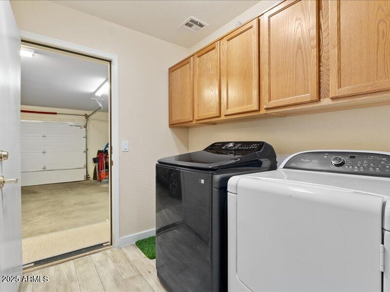 Laundry roomwith cabinets