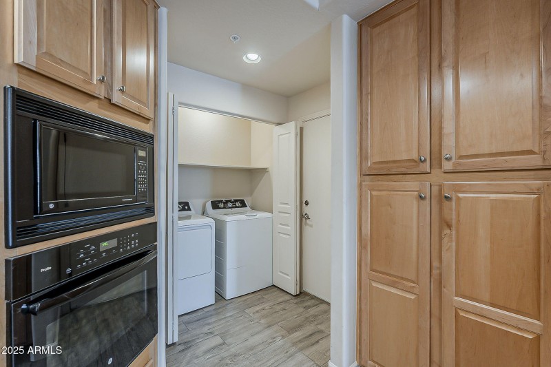 Laundry closet off of kitchen
