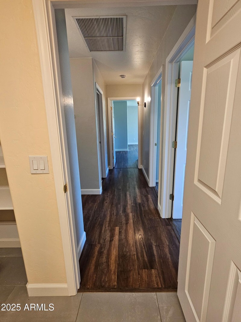 hall from laundry to primary bedroom