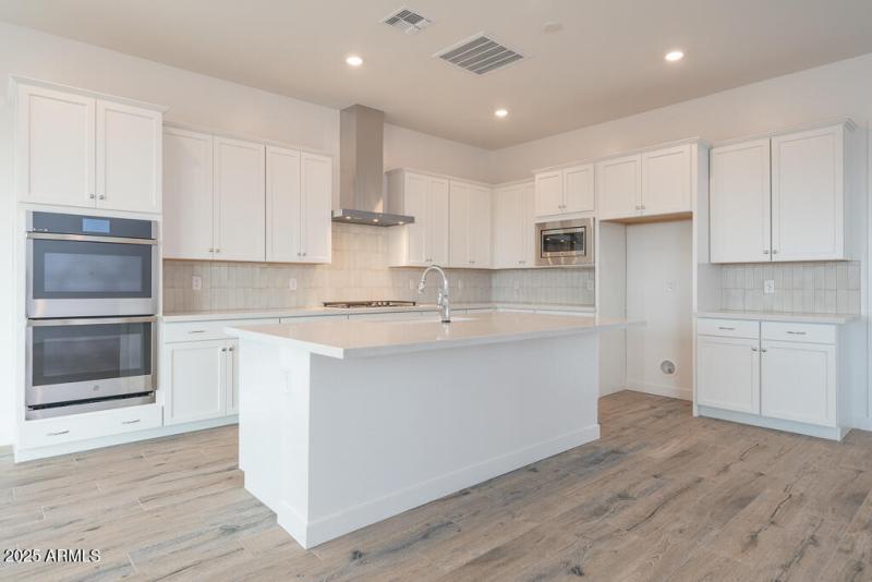 Tri Pointe Soleo 239 - Kitchen-1MLS