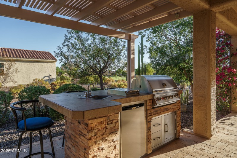 74) OUTDOOR KITCHEN