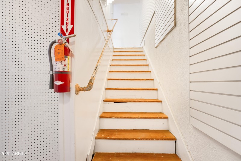 Stairs from showroom to basement