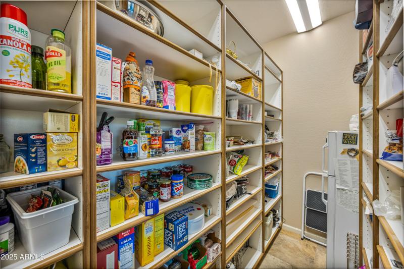 Walkin pantry with refrigerator