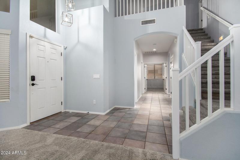 Entry Hall view to upstairs & Ofc-Den-5t