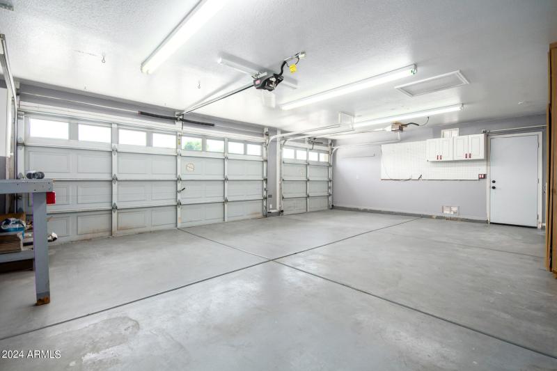 3-Car Garage with Storage Cabinets & Wor