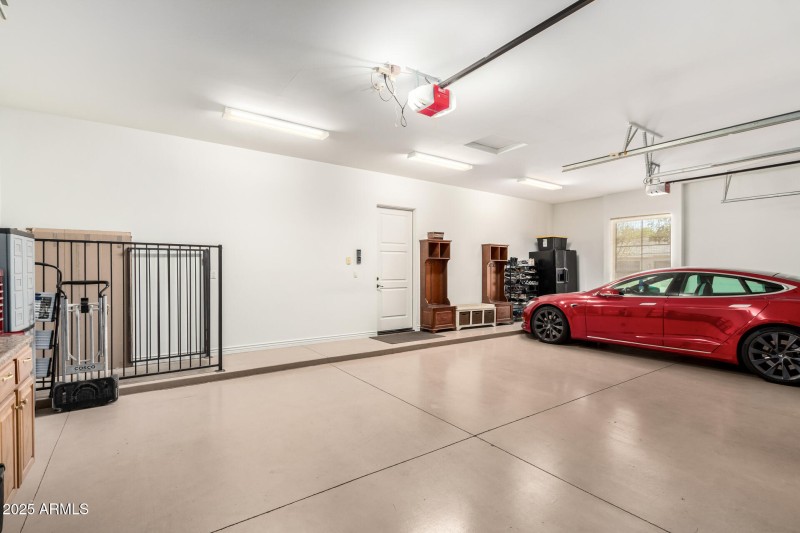 Inside 3car Garage with Charging Station
