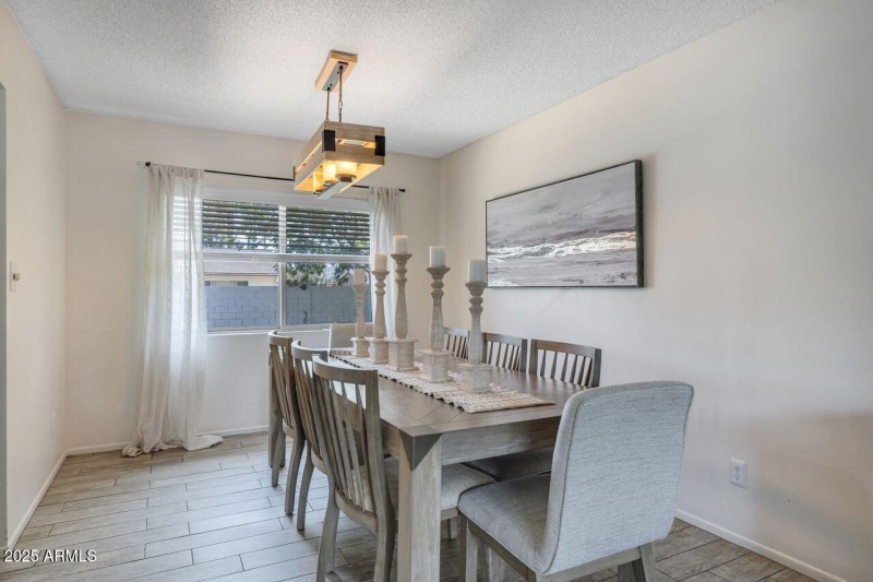 Elegant Dining Room with Modern Lighting