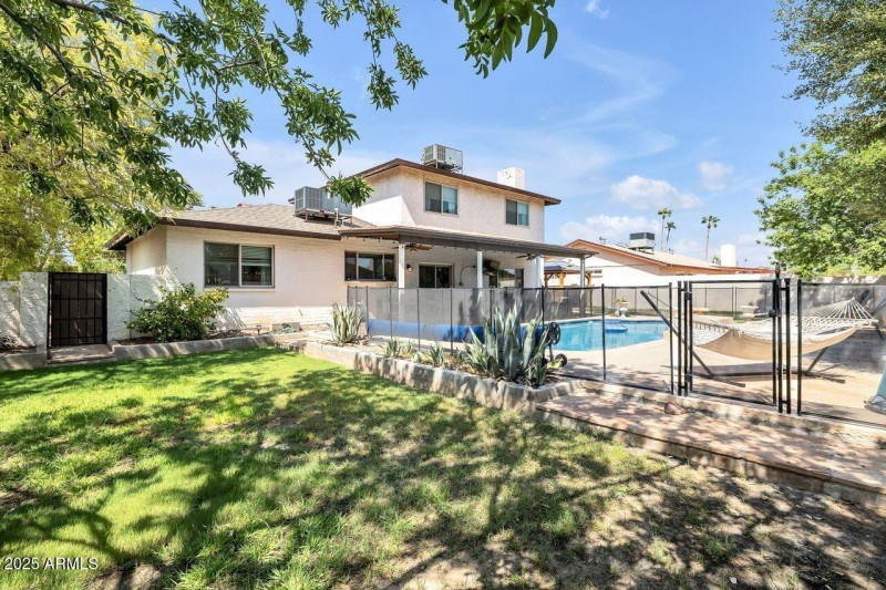 Spacious Backyard with Greenery