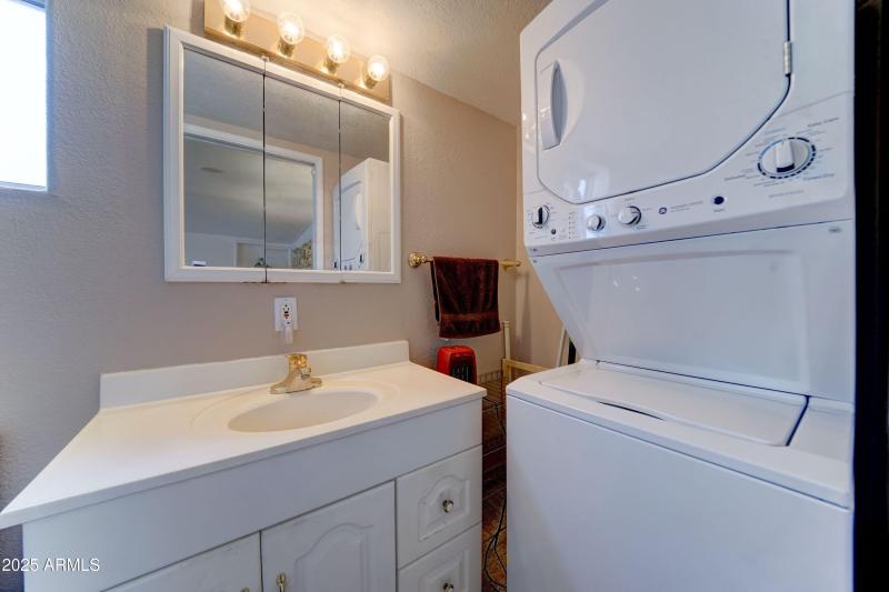 Stacked laundry in 2nd bathroom