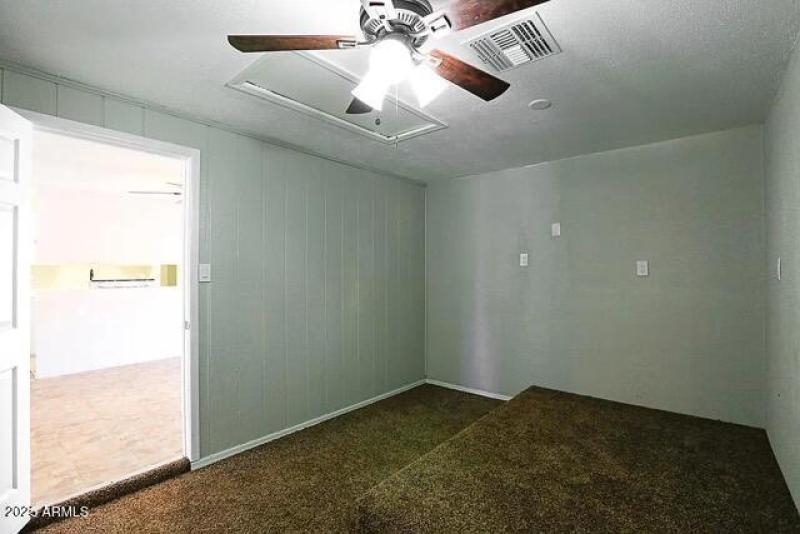 Storage Room with Carport Entrance