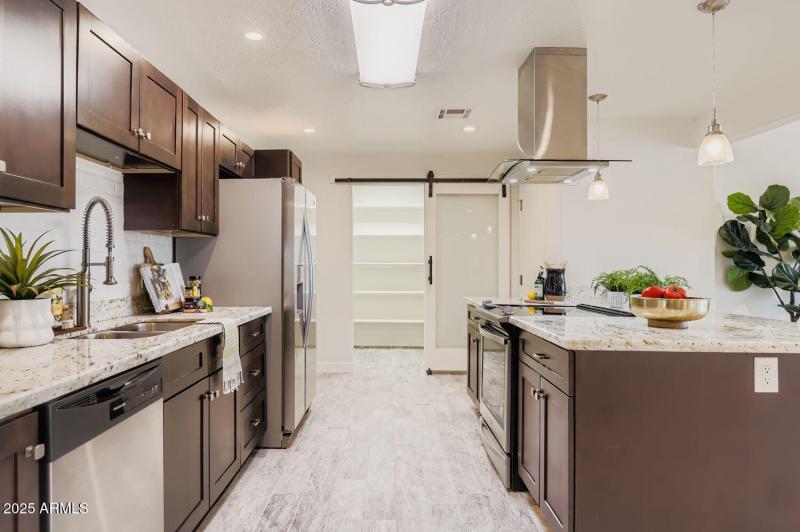 Kitchen with large walk in pantry