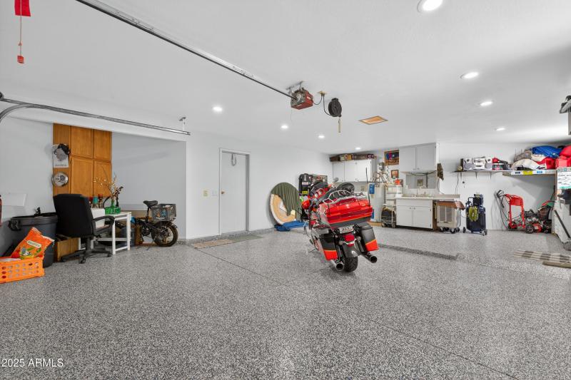2+ car Garage w/golf cart space