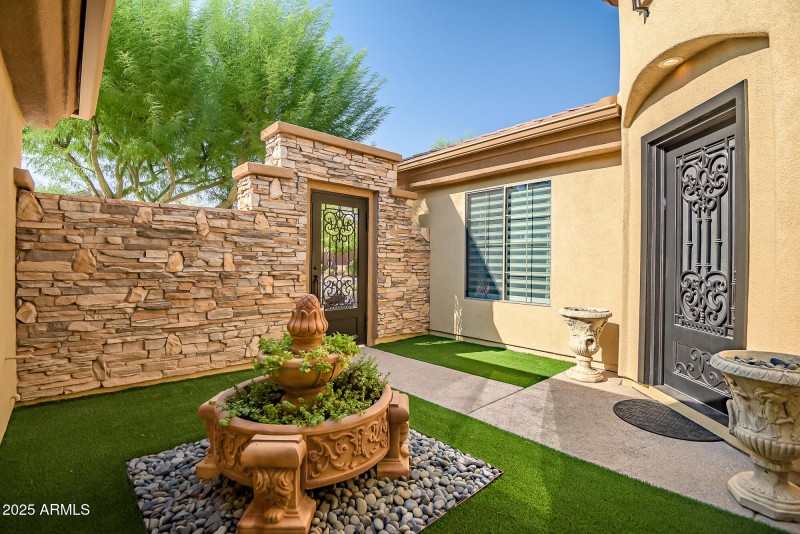Private Courtyard with Custom Iron Gate