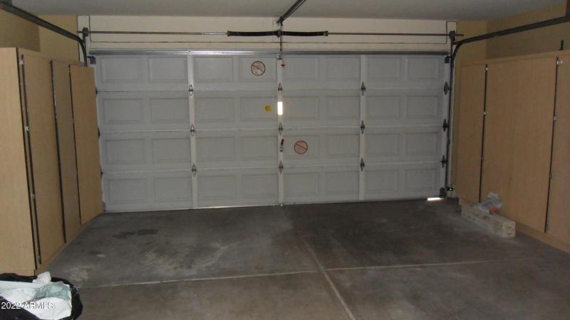 GARAGE W/ OPENER AND CABINETS