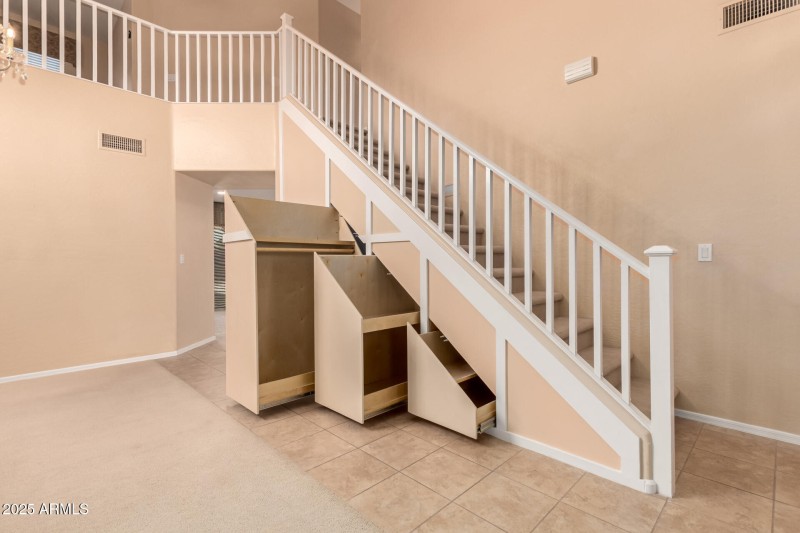 built-in staircase storage drawer