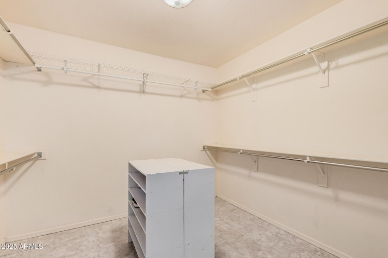 18 Primary Walk-in Closet