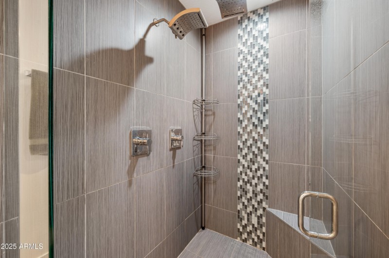 Fully tiled shower surround