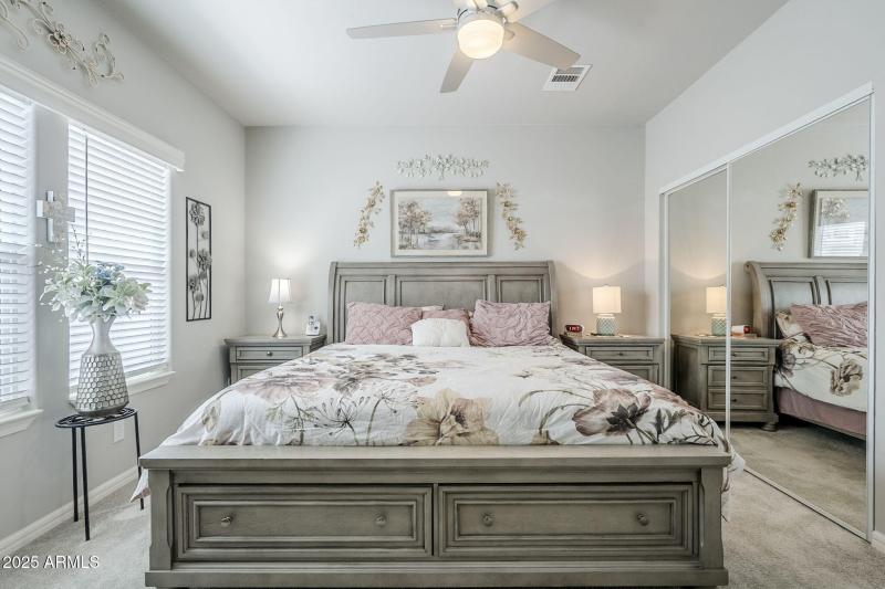 Oversized primary bedroom with king bed