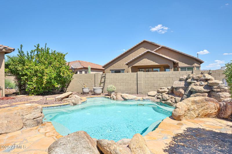 Heated Pool with Rock Water Feature