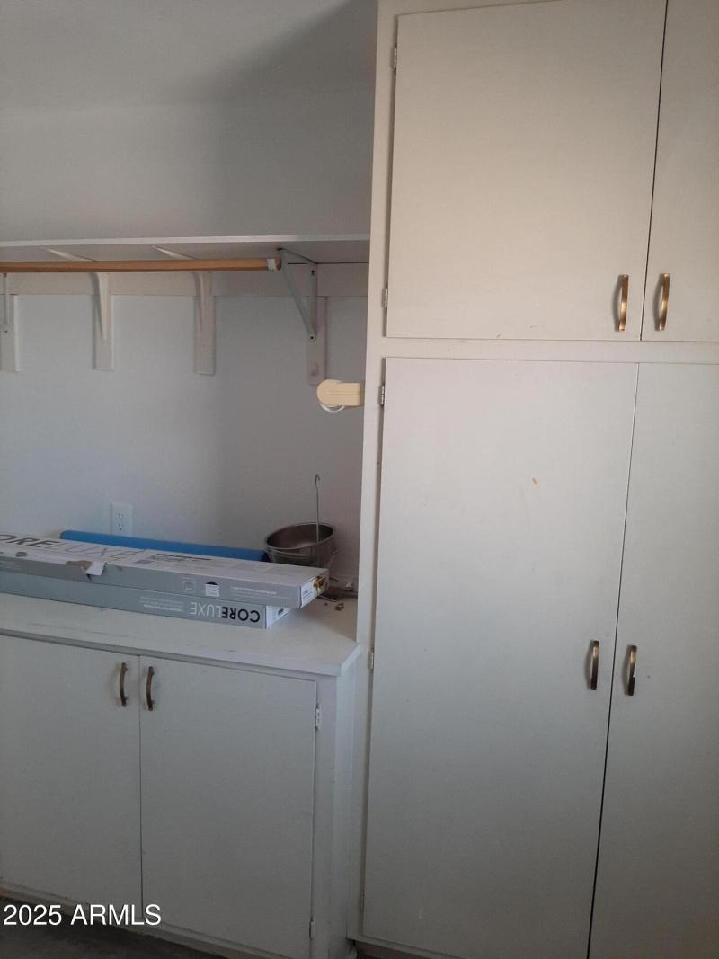 Cabinets in Garage and Laundry area
