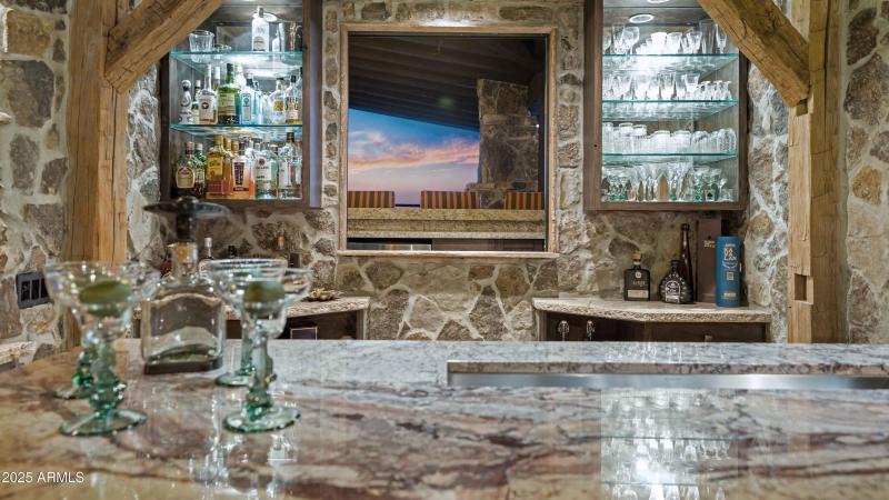 BAR WINDOW OPENS TO OUTDOOR BAR