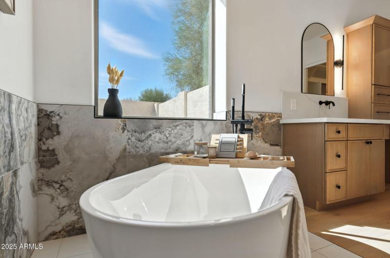 Sleek free standing soaking tub
