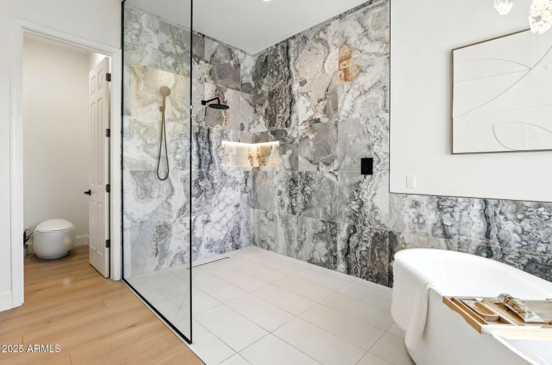 Shower enclosure soaring 10 feet high