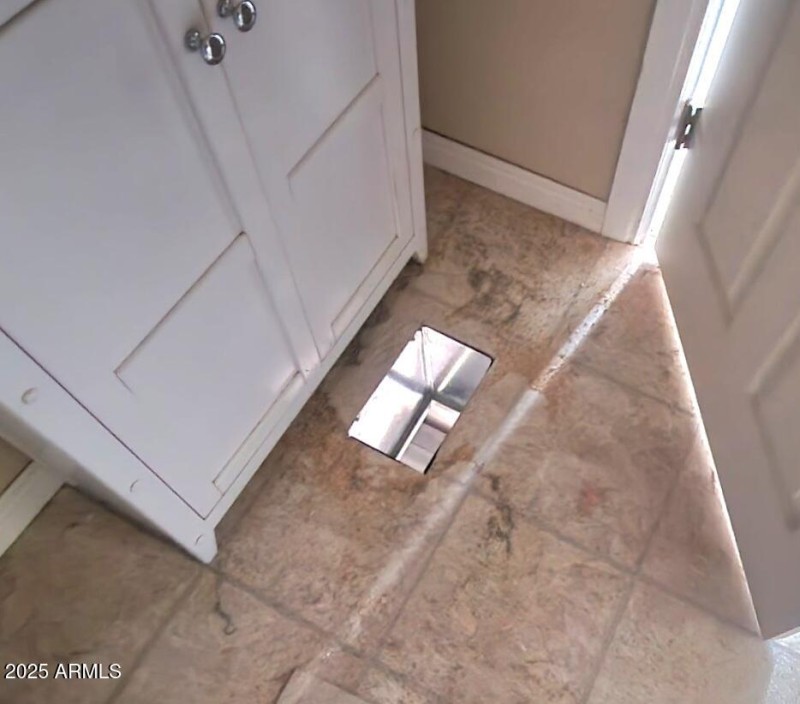 HVAC Floor Register Opening Up Bath