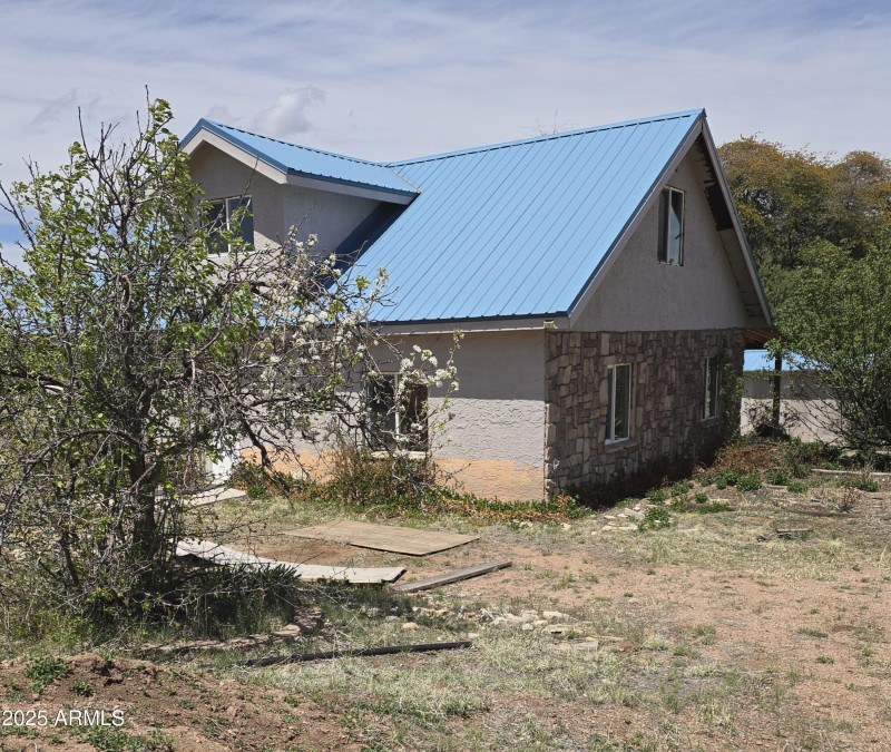 Front of Hm Faces South