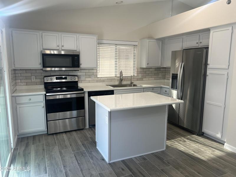 Fresh Painted Cabinets and New Counters