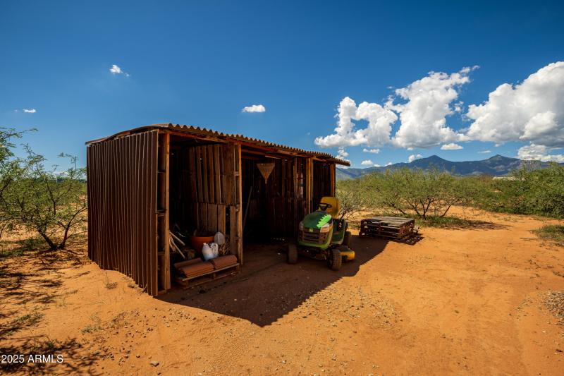 Covered storage for yard tools