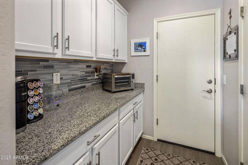 Additional cabinetry off kitchen