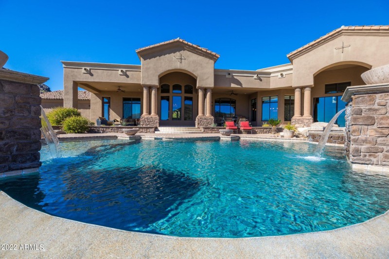 VIEW OF POOL AND HOUSE FROM NEGATIVE EDG