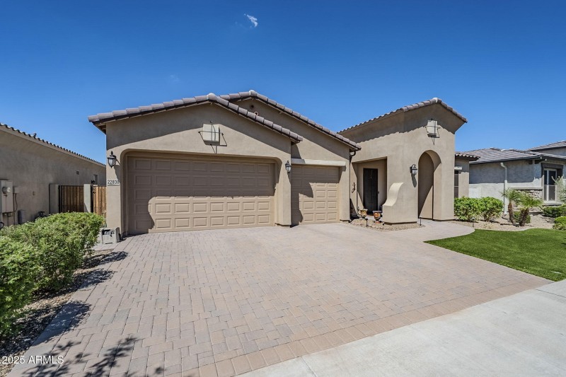 3Car Garage, Pavered Drive & Front Entry