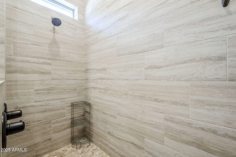 Procelain Shower with Stone Floor