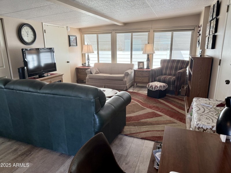 7750 E. BROADWAY RD. #123